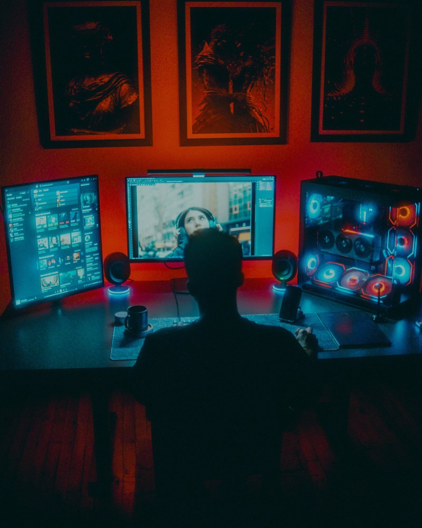 Gaming battle-station bathed in red light